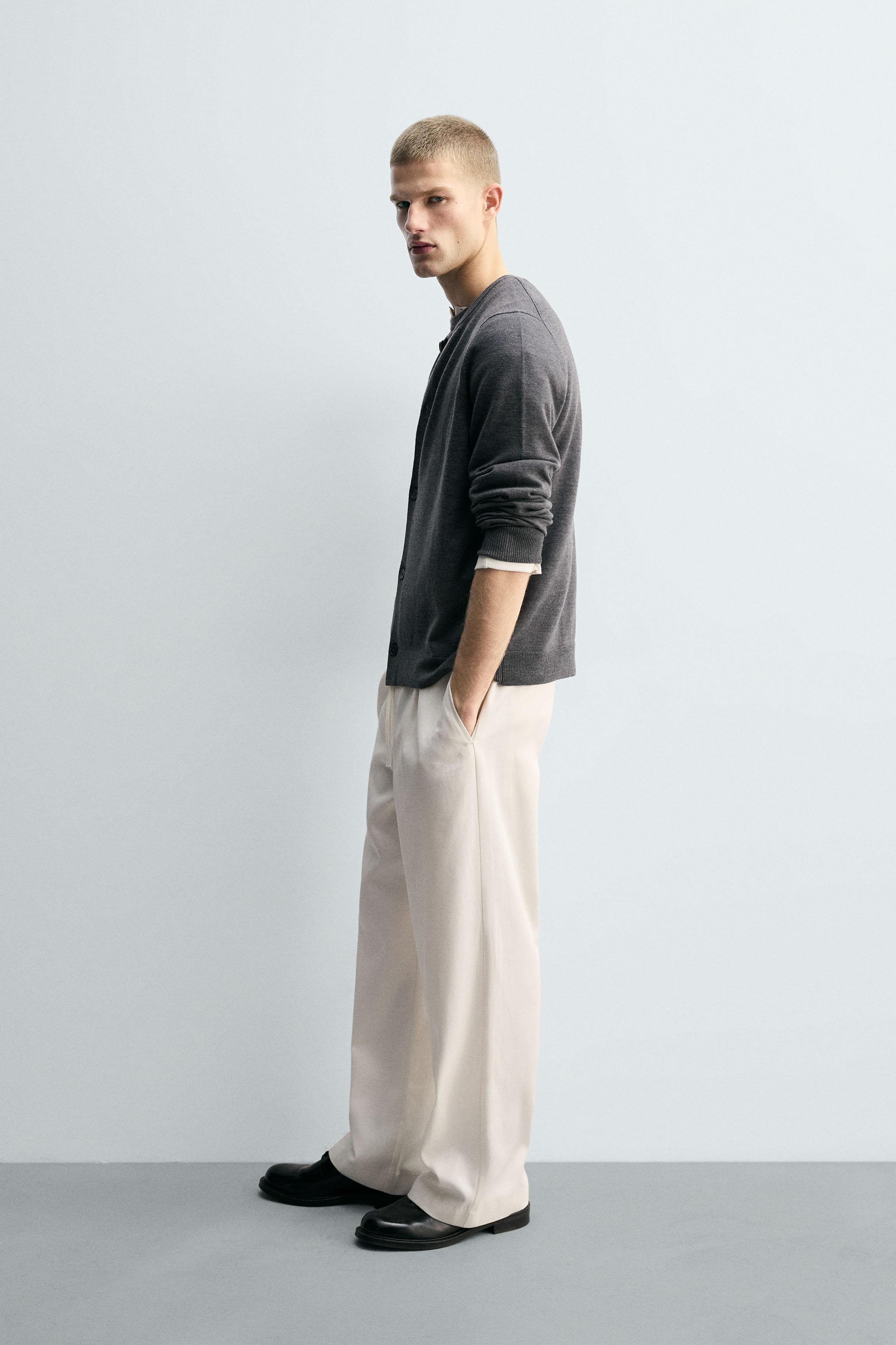 TEXTURED PLEATED PANTS